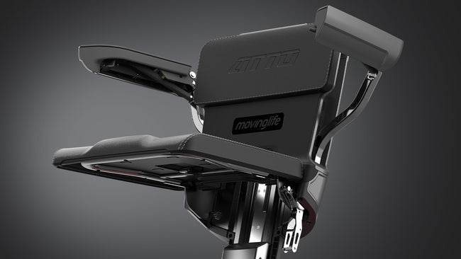 Close-up of Movinglife ATTO mobility scooter padded seat and armrests on a dark background.