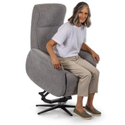 Senior woman relaxing in a light grey Movinglife EZY COMFORT lift chair