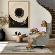Senior woman reading in a light grey Movinglife EZY COMFORT lift chair